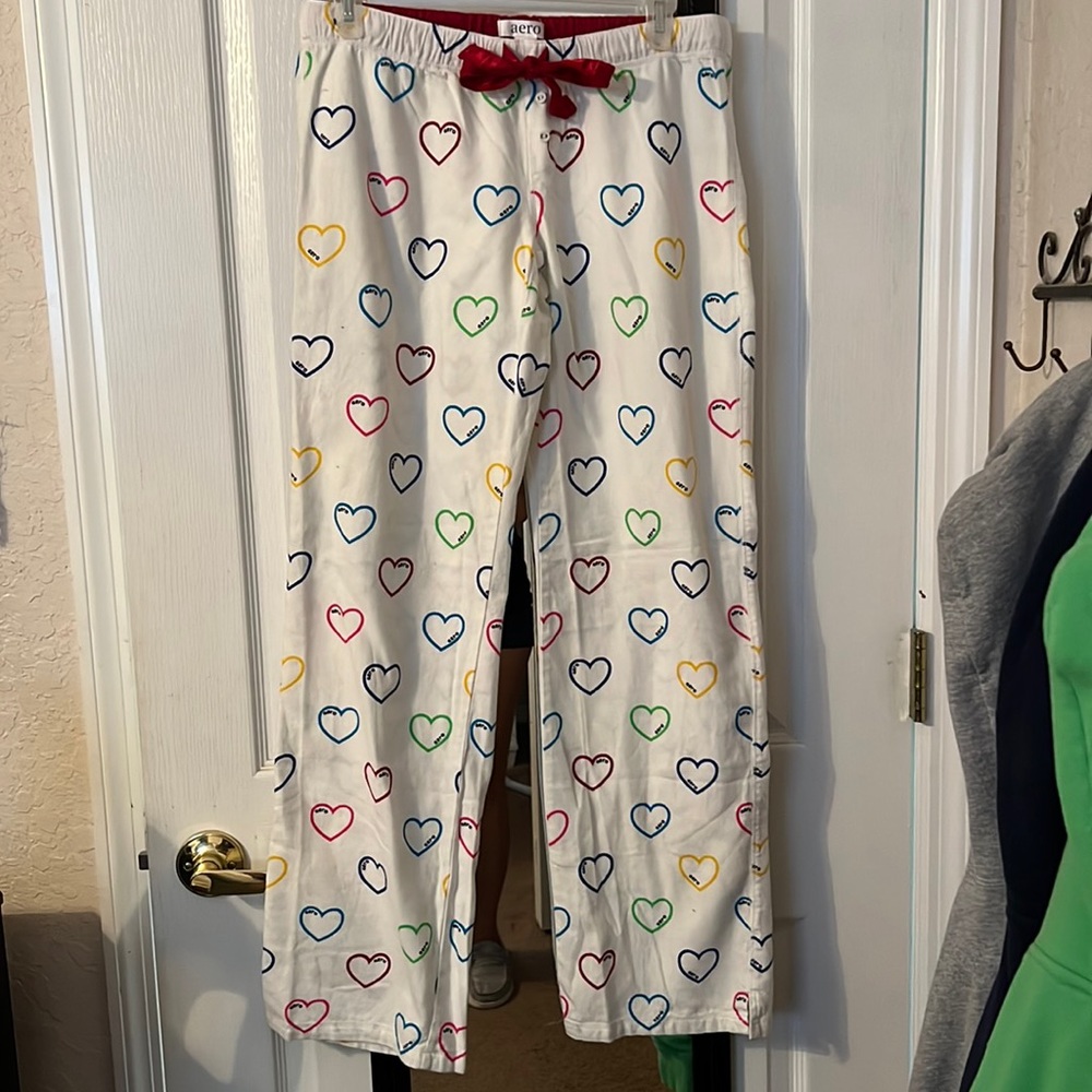 Aero sweatpants. Size S. White with color hearts.